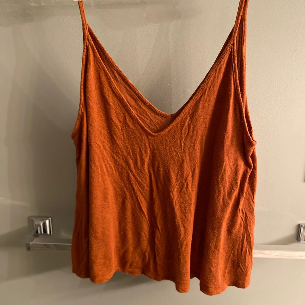 A burnt orange tank top